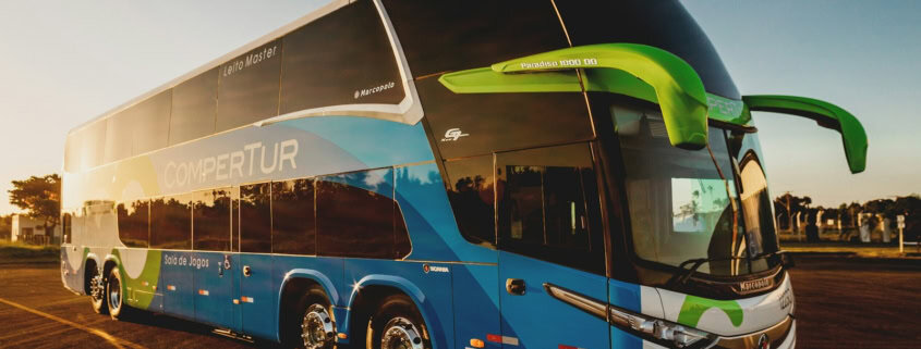 parked blue and black Compertur bus